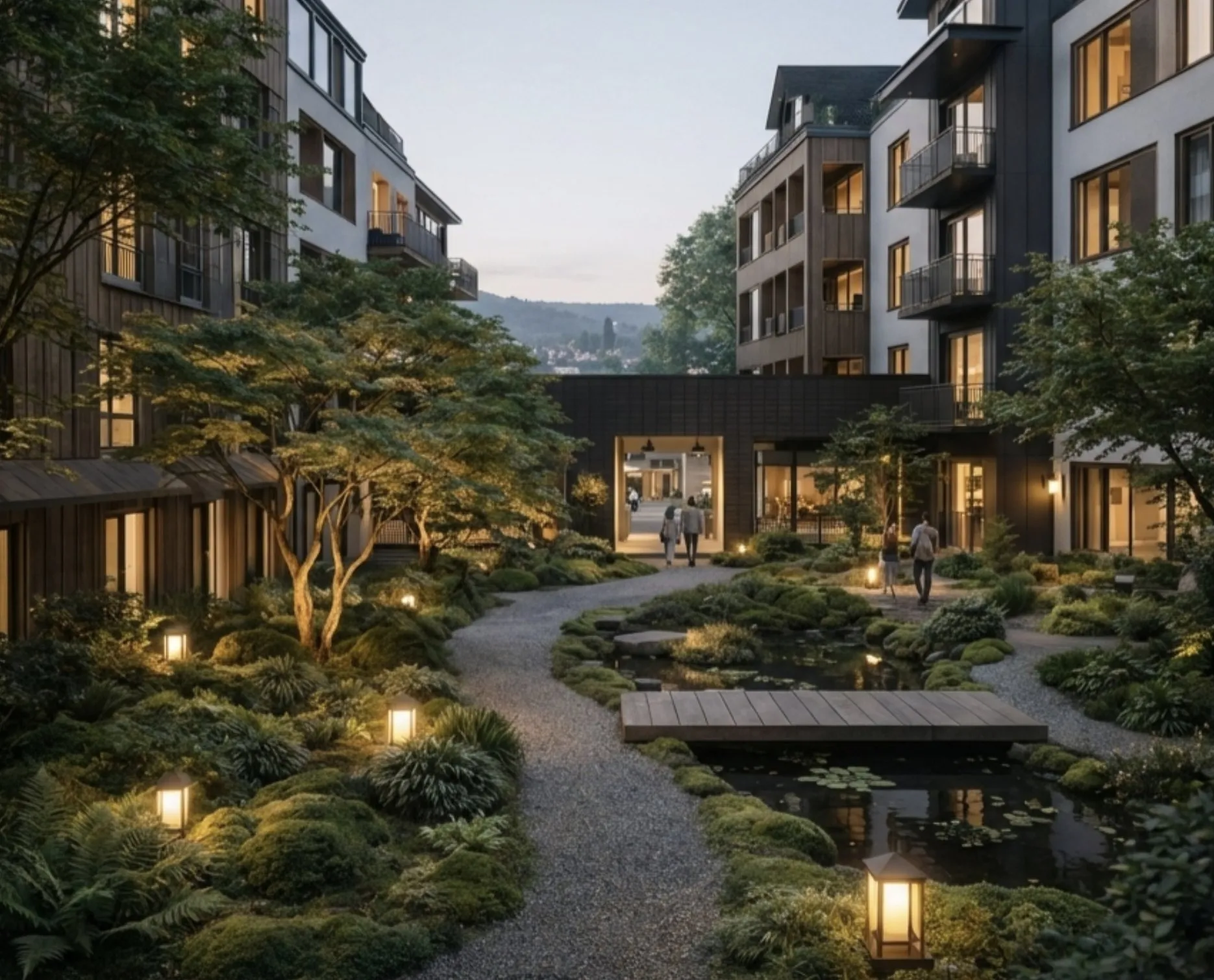 A courtyard at dusk with landscape lighting and neighbors gathered.